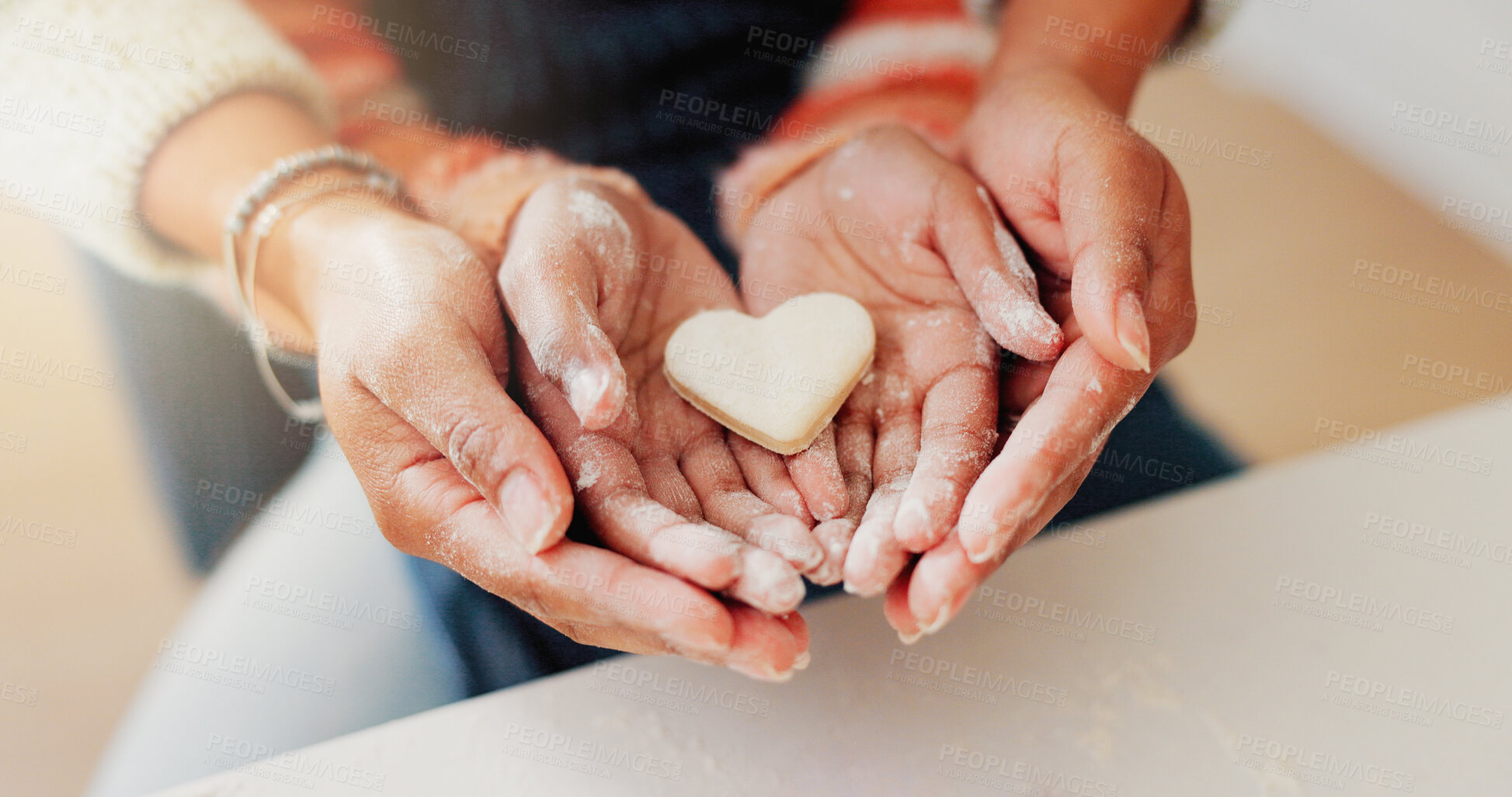 Buy stock photo Heart cookie, family or hands in home with baking, bonding or support in learning to cook. Above, parent or child with love shape dessert, healthy relationship or connection for cognitive development