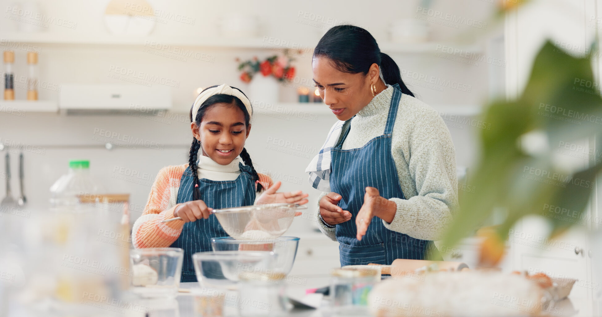Buy stock photo Baking, mixing and mother teaching daughter in home kitchen with bowl for child development or growth. Cooking, instructions and process with girl learning how to bake in apartment for family time