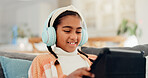 Headphones, learning and tablet with girl child on living room sofa for interactive course. App, education and smile with happy kid in home for online lesson, remote study or virtual streaming