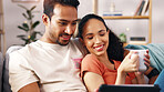 Happy couple, relax or coffee with tablet on sofa for online streaming or entertainment in home. Man, woman or hug with smile, cup or technology on couch for movie subscription, show or app in house