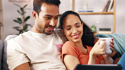 Buy stock photo Happy couple, relax or coffee with tablet on sofa for online streaming or entertainment in home. Man, woman or hug with smile, cup or technology on couch for movie subscription, show or app in house