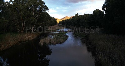 Buy stock photo River, landscape and countryside with nature, view and blue sky with trees, outdoor and environment. Empty, clouds and eco friendly with lake, ecology or mountains with sustainability in Canada