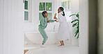 Mom, child and singing with brush in bathroom for fun grooming or spa day together in home. Mother, girl or dancing with vibe, haircare or playful karaoke for beauty, love or salon treatment in house