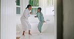 Mom, girl and dancing with brush in bathroom for fun grooming or spa day together in home. Mother, child or singing with vibe, haircare or playful karaoke for beauty, love or salon treatment in house