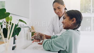 Buy stock photo Mom, girl and washing hands with soap in bathroom sink for cleaning, disinfection or hygiene. Mother, daughter or child rinsing with water, tap or faucet for bacteria, germs or dirt removal in home