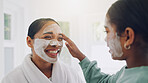 Happy mom, child and skincare with face mask in bathroom for beauty spa day or routine in home. Girl, daughter or helping mother with smile for facial treatment, grooming or salon cosmetics in house
