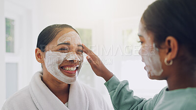 Buy stock photo Happy mom, child and skincare with face mask in bathroom for beauty spa day or routine in home. Girl, daughter or helping mother with smile for facial treatment, grooming or salon cosmetics in house