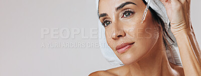 Buy stock photo Skincare, thinking or mature woman with dropper in studio, apply hyaluronic acid or anti aging treatment. Banner, vision or person with hydration serum for skin glow, mockup space or white background