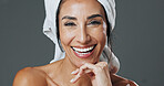 Portrait, woman and skincare in studio for anti aging, confidence and aesthetic in dermatology. Mature person, treatment and towel with cosmetology, beauty or cosmetics with smile on gray background
