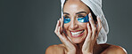 Happy woman, studio or banner with eye patches for skincare or collagen on a gray background. Female person, model or smile with mask or facial for beauty cosmetics, anti aging or hydration on space