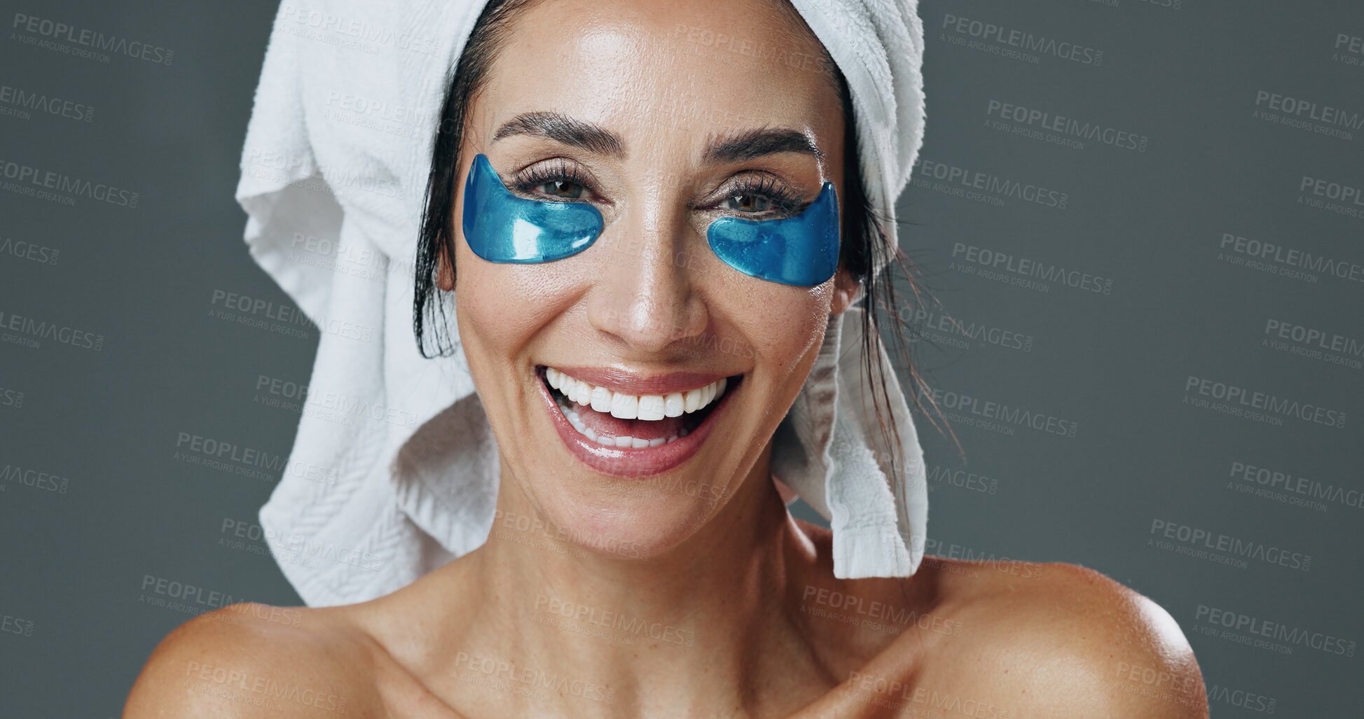 Buy stock photo Skincare, portrait or woman with patches in studio, dark circles reduction or anti aging treatment. Beauty, smile or mature person with collagen eye mask for hydration, self care or gray background