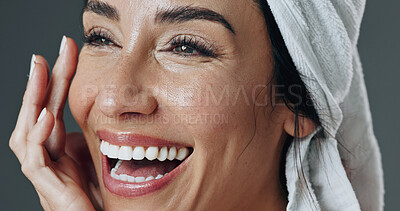Buy stock photo Happy, woman and skincare in studio for anti aging, confidence and aesthetic in dermatology. Mature person, treatment and towel with cosmetology, beauty or cosmetics with glow on gray background
