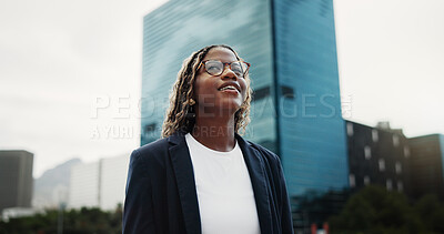 Buy stock photo Thinking, real estate and black woman in city, smile and vision for investment opportunity. Low angle, employee or African person in street, insight of urban location or property evaluation or choice
