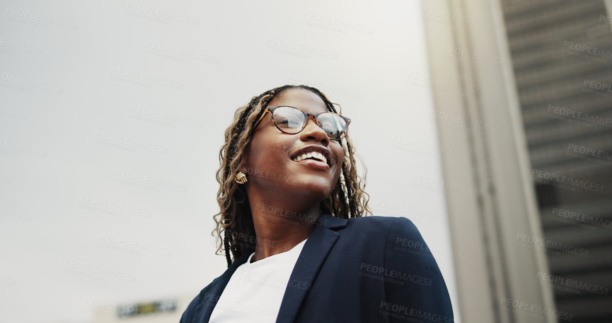 Buy stock photo Reflection, real estate and black woman in city, smile or vision for investment opportunity. Low angle, thinking or African person in street, insight of urban location or property evaluation or space