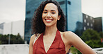 Portrait, realtor and businesswoman in city with smile, confidence or property investment opportunity. Happy, person or real estate agent in town with urban development, entrepreneurship or about us.