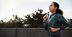 Athlete, woman and running for fitness in city with pace training, morning cardio and stamina. Space, runner and active with jog outdoor for sport performance, wellness challenge and health workout