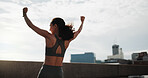 Athlete, woman and fitness celebration in city for running goal, cardio pace target and milestone. Space, back and runner with fist pump on bridge for exercise success, health progress or achievement