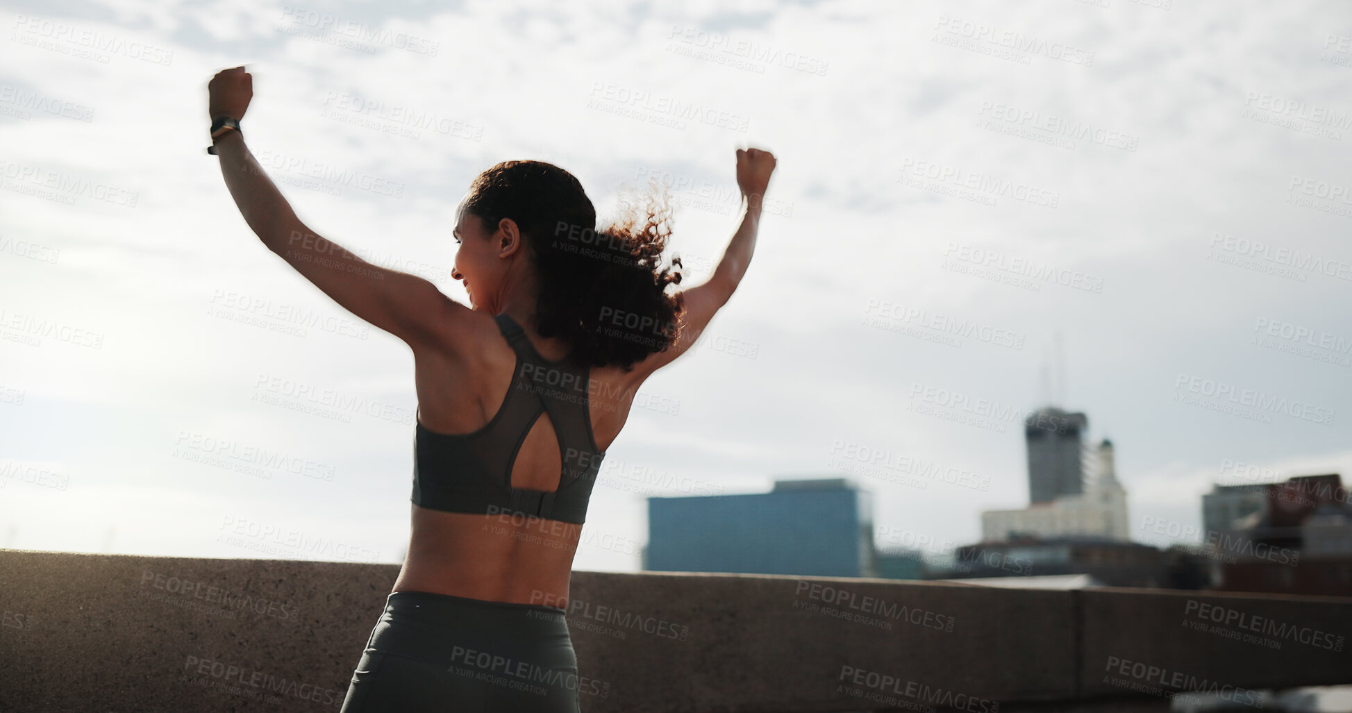 Buy stock photo Athlete, woman and fitness celebration in city for running goal, cardio pace target and milestone. Space, back and runner with fist pump on bridge for exercise success, health progress or achievement