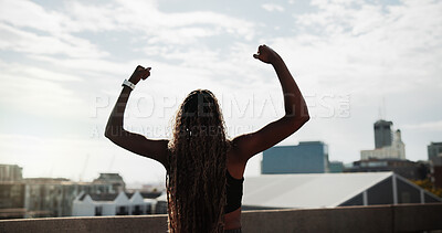 Buy stock photo Runner, woman and fitness celebration in city for running goal, cardio pace target and milestone. Active, back or athlete with fist pump on bridge for exercise success, health progress or achievement