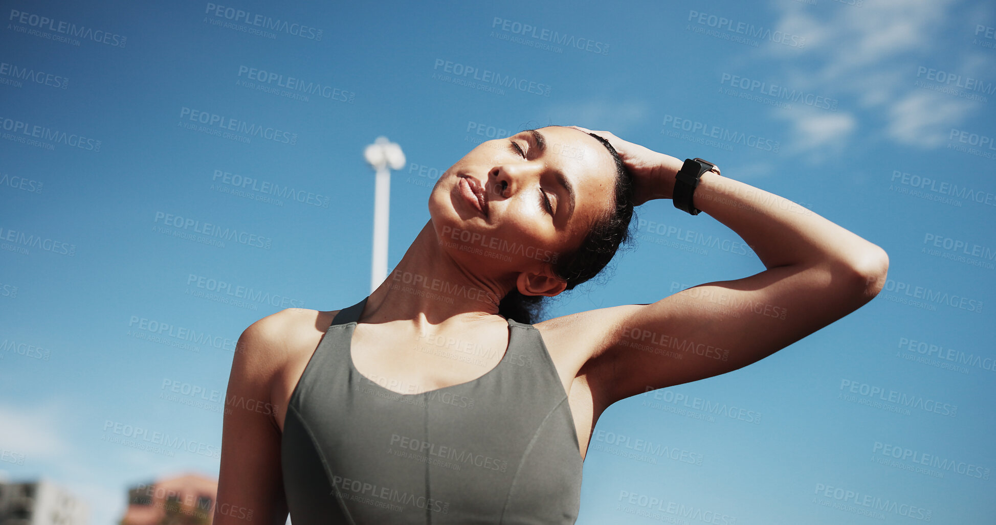 Buy stock photo Fitness, woman and stretching neck in city for exercise, training and warm up for workout with blue sky. Sports, runner and person ready for wellness, health and mobility for active hobby in town
