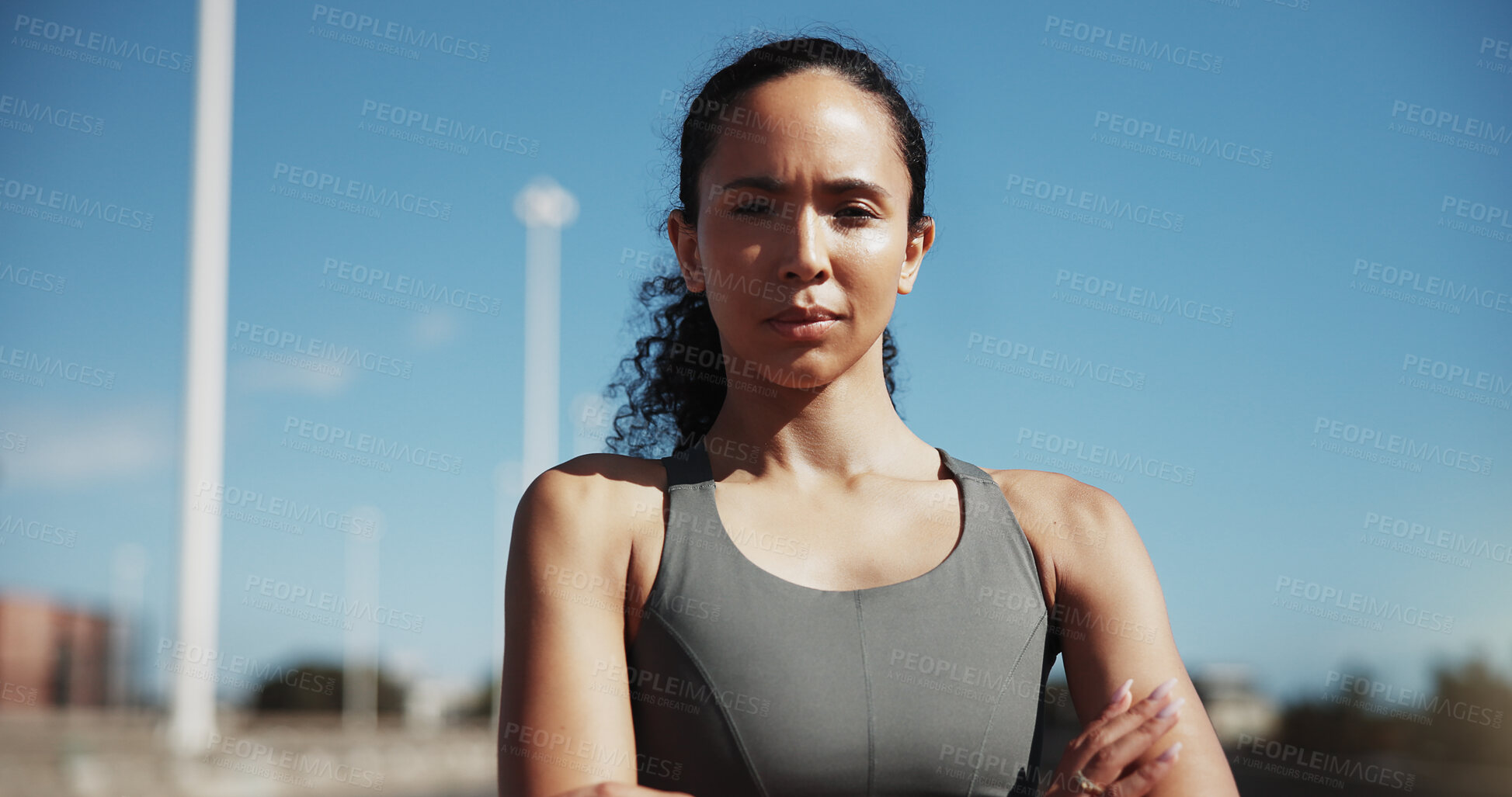 Buy stock photo Fitness, portrait or woman in city with arms crossed, pride or rest after physical activity. Sports, serious or female person outdoor with confidence, active hobby or performance break in New Zealand