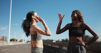 Buy stock photo Fitness, women or happy with high five in city for race challenge, marathon pace target or goals. Active, friends or runners with celebration on bridge for cardio success, health progress or wellness