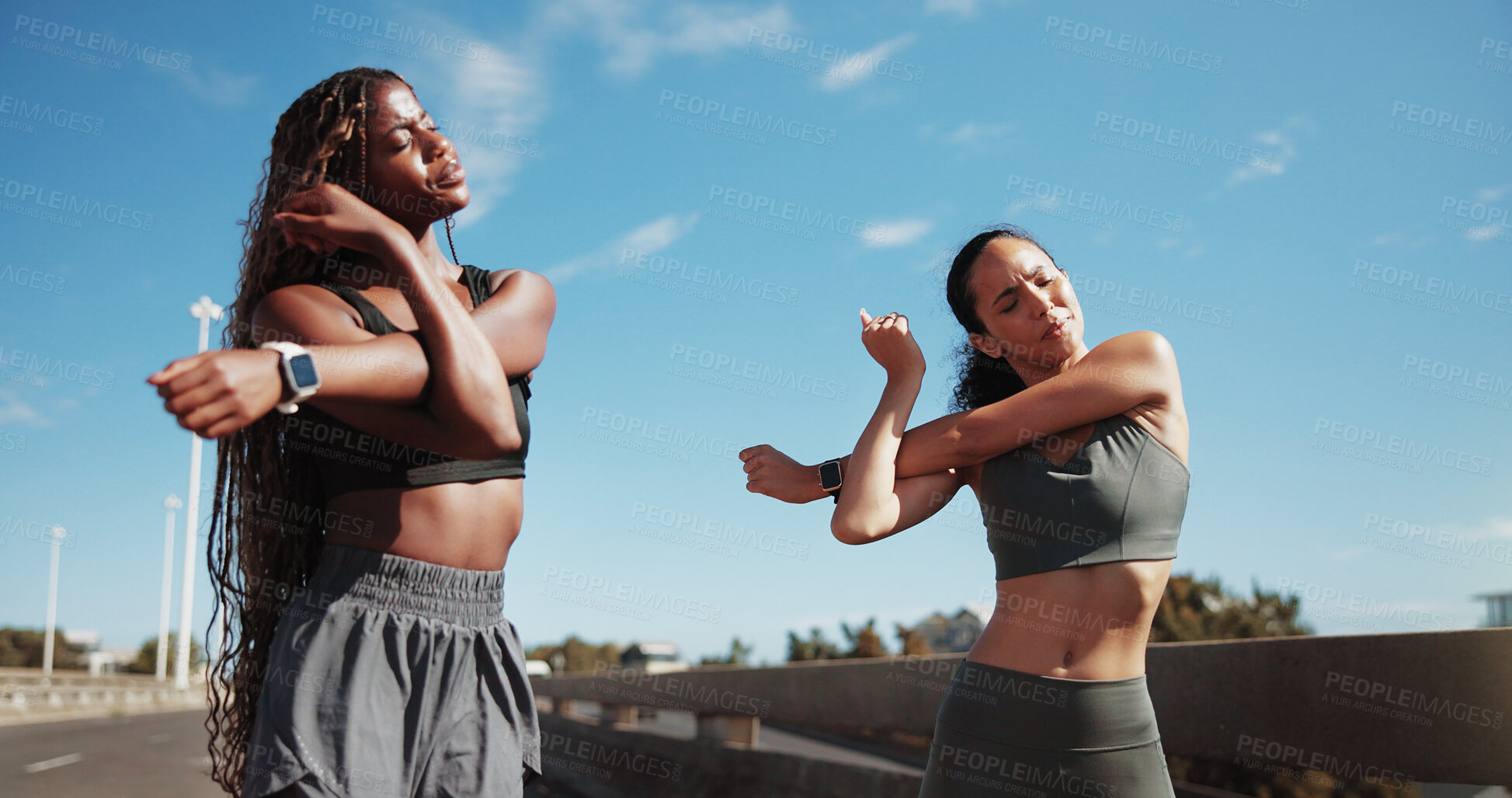 Buy stock photo Friends, stretching and women in city for fitness, training and warm up for workout with blue sky. Sports, runner and people ready for wellness, exercise and mobility for active hobby together