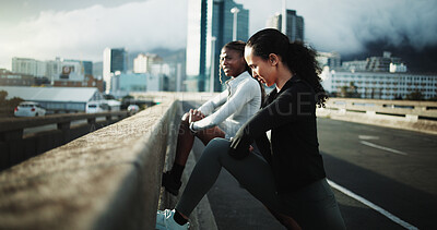 Buy stock photo Women, friends and stretching for fitness, warm up and routine for outdoor training on street. City bridge, chat and people with leg exercise for health, endurance or marathon practice together
