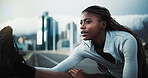 Fitness, stretching and black woman in city for workout, cardio exercise or thinking on bridge. Female person, overcast or runner warm up for wellness, sports and vision outdoor on urban street
