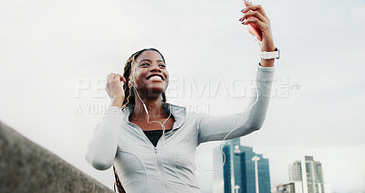 Buy stock photo Exercise, selfie and black woman in city with music, cardio workout or smile on bridge. Female person, earphones or runner training for wellness, sports and playlist outdoor with fitness photography