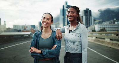 Buy stock photo Happy, portrait and women in city for fitness, cardio workout or support on bridge. Female people, overcast or runners training for wellness, sports and exercise outdoor on urban street together