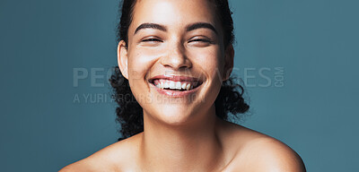 Buy stock photo Portrait, skincare and beauty with funny woman, glow and shine with dermatology on blue background. Cosmetics, laugh and person with aesthetic in studio, natural skin and wellness with self care