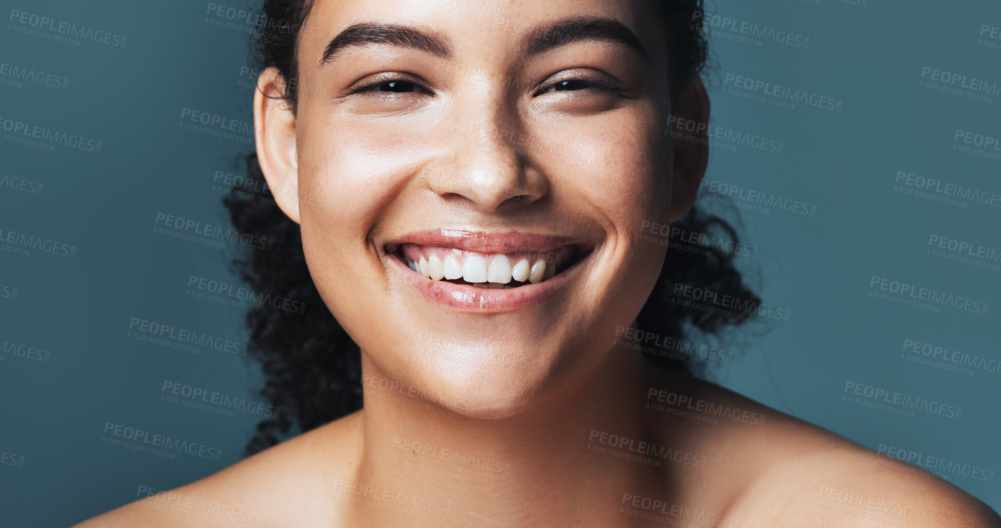 Buy stock photo Portrait, skincare and beauty with happy woman, glow and shine with dermatology on blue background. Cosmetics, smile and person with aesthetic in studio, natural and wellness with healthy skin