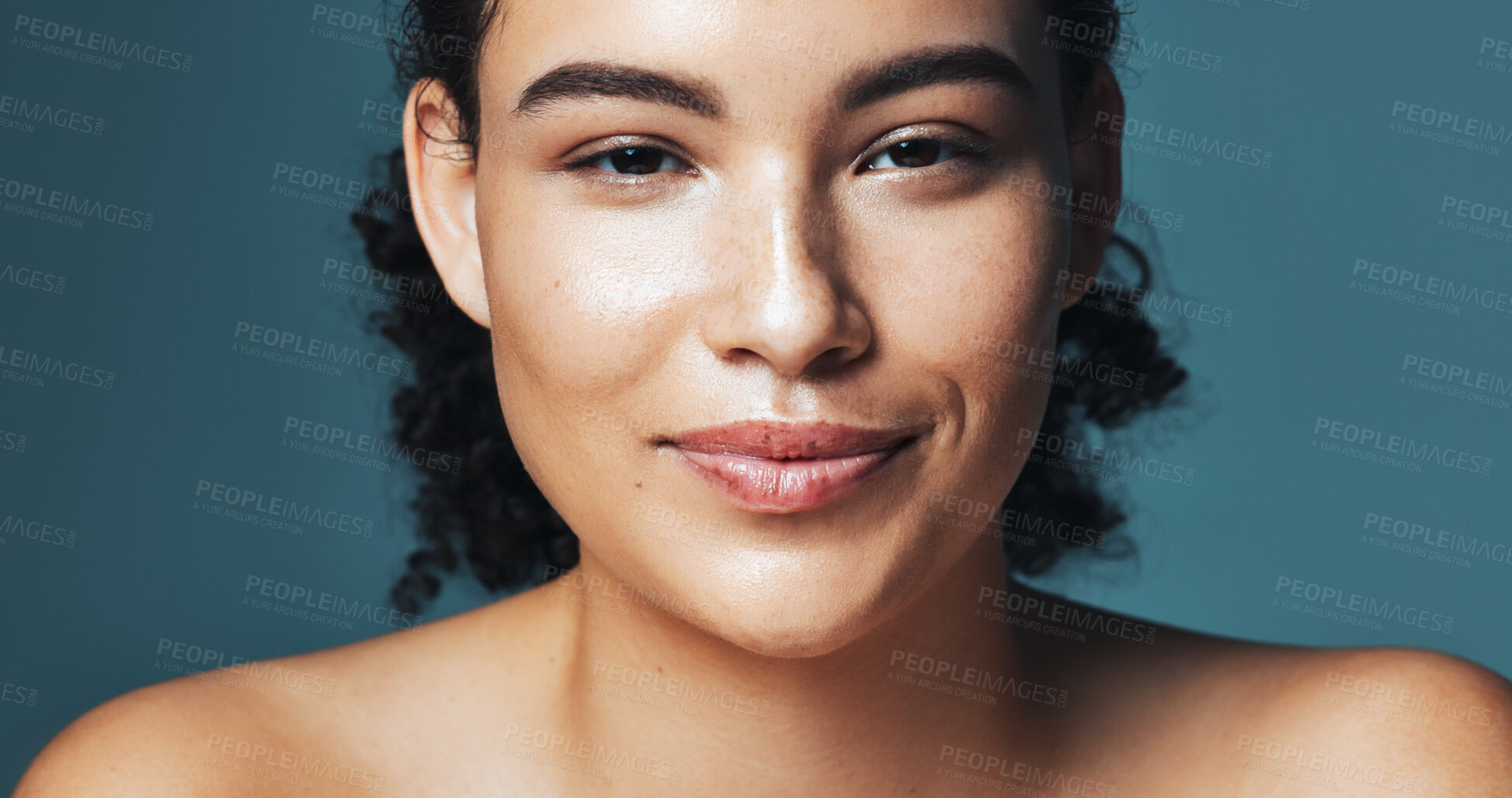 Buy stock photo Skincare, smile and portrait of woman in studio for cosmetics, makeup and dermatology. Mockup, happy and person for beauty, salon and facial treatment for wellness, glow and shine on blue background