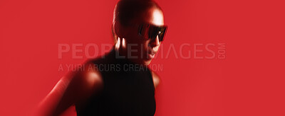 Buy stock photo Fitness, speed and woman in studio with blur, cardio or stamina exercise with challenge on banner. Intense, fast movement or person with space, sports hobby or endurance workout on red background