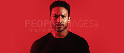 Buy stock photo Serious, man and portrait with banner in studio of fighter ready for battle on a red background. Male person, neon and fitness with confidence for performance training or commitment on mockup space