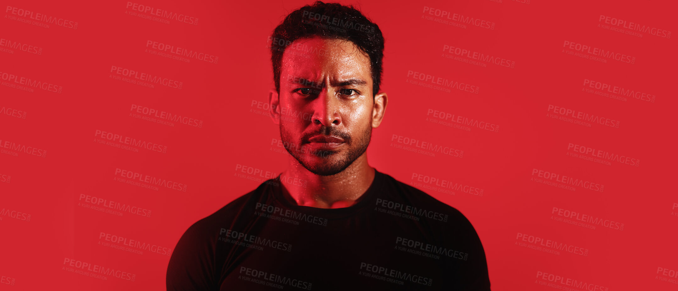 Buy stock photo Serious, man and portrait with banner in studio of fighter ready for battle on a red background. Male person, neon and fitness with confidence for performance training or commitment on mockup space