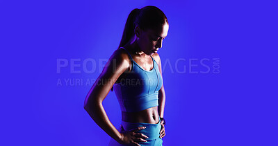 Buy stock photo Tired, woman and sweating in studio with exercise break, thinking or training recovery for wellness. Mockup space, active person or athlete with workout rest, fatigue or reflection on blue background