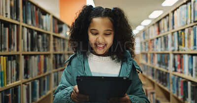 Buy stock photo Girl, child and learning in library with tablet, ebook website or online literature for development. Happy, student and reading at school with tech, storytelling app or education for knowledge growth