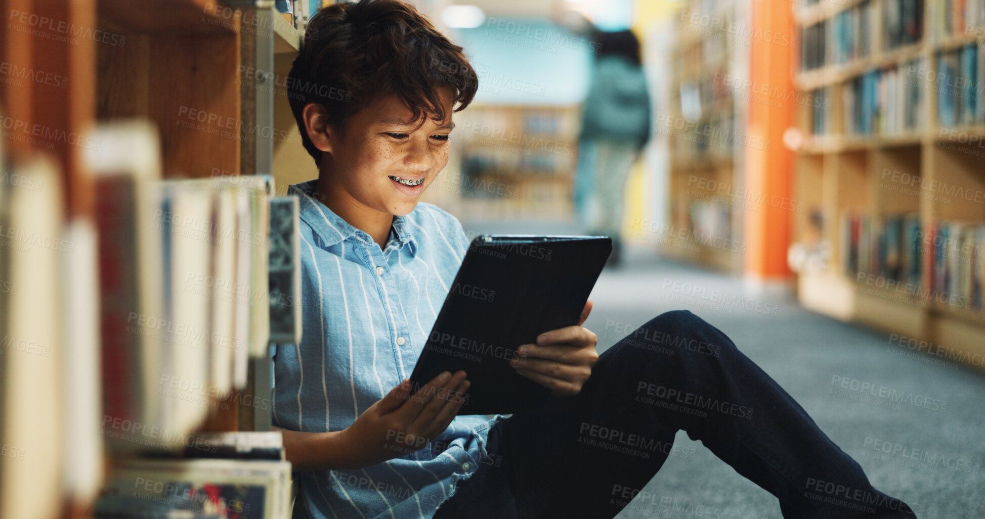 Buy stock photo Learning, student and tablet with boy in library for back to school development, growth or study. App, education and reading with child learner at academy for future, knowledge or online research