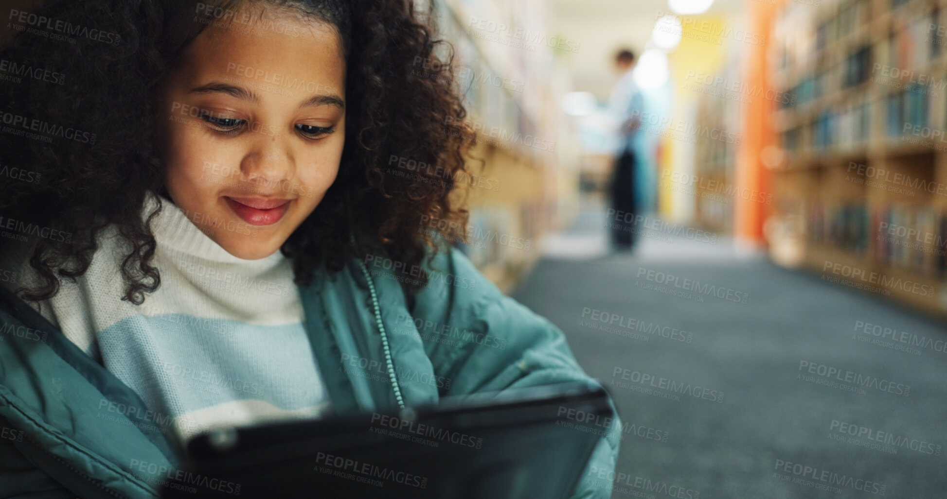 Buy stock photo Girl, child and browsing in library with tablet, ebook website and online literature for development. Kid, student and reading at school with tech, storytelling app and education for knowledge growth