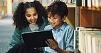 Learning, student and tablet with children in library for back to school development, growth or study. App, education and reading with learner friends at academy for future, knowledge or research