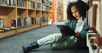 Buy stock photo Learning, student and tablet with girl in library for back to school development, growth or study. App, education and reading with child pupil at academy for future, knowledge or online research