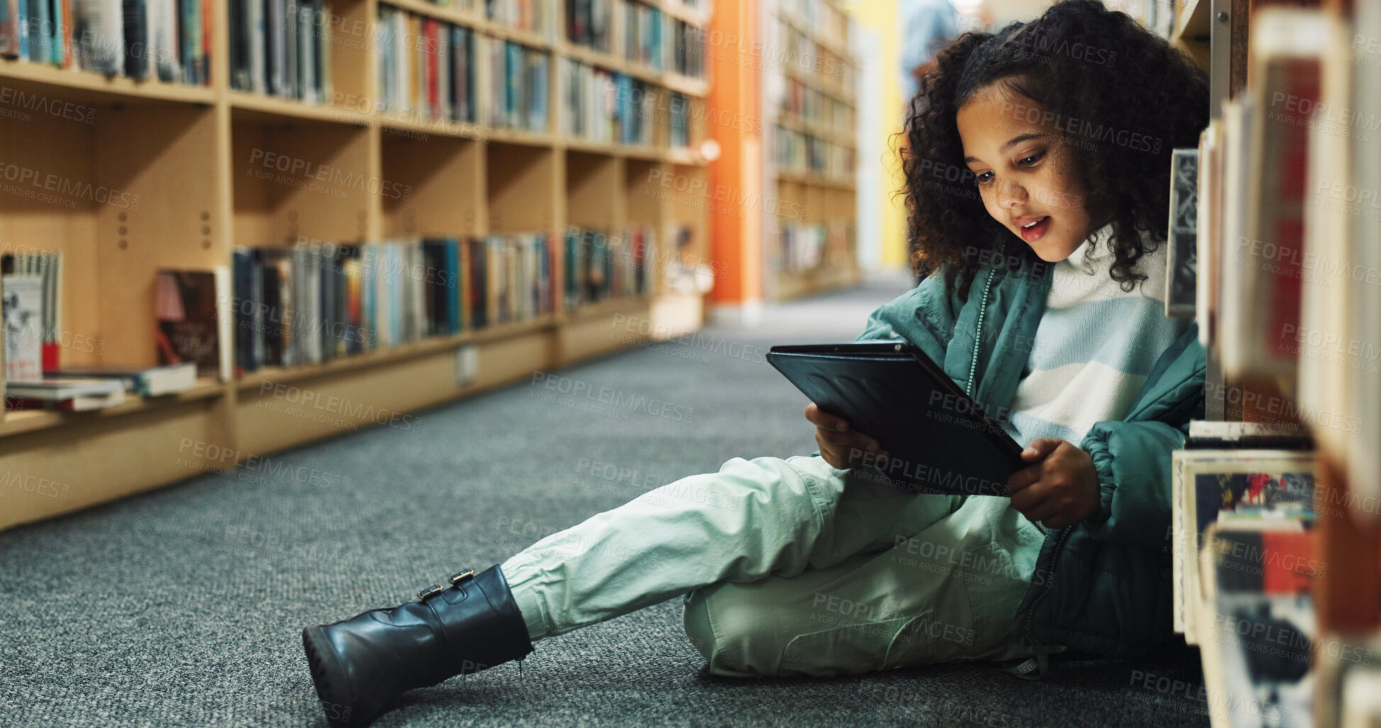 Buy stock photo Learning, student and tablet with girl in library for back to school development, growth or study. App, education and reading with child pupil at academy for future, knowledge or online research