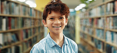 Buy stock photo Middle school, portrait or boy in library with smile, knowledge or scholarship in academic development. Education, child or student at academy with books, confidence or growth in learning opportunity