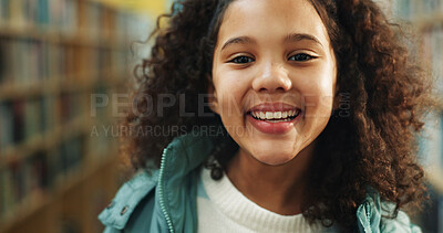 Buy stock photo Elementary school, portrait or kid in library with smile, knowledge or scholarship in academic development. Education, child or student with pride, confidence or growth in learning opportunity.
