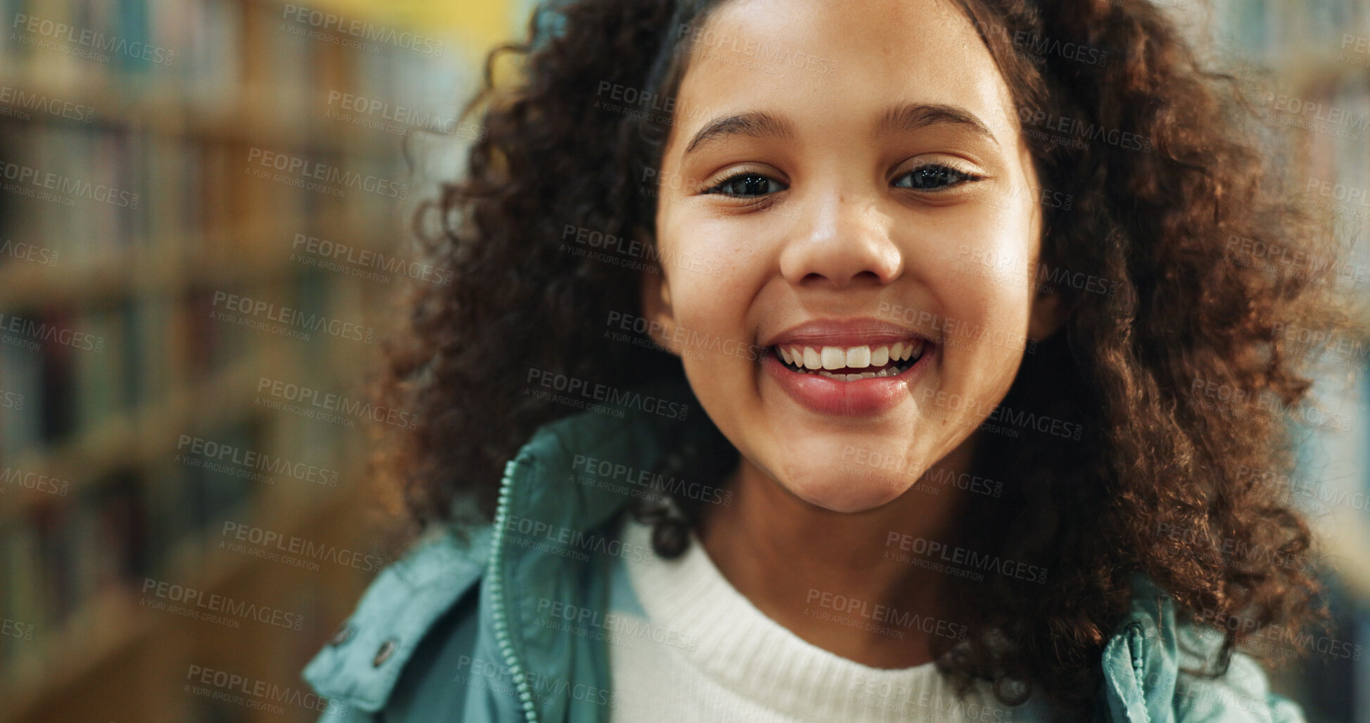 Buy stock photo Elementary school, portrait or kid in library with smile, knowledge or scholarship in academic development. Education, child or student with pride, confidence or growth in learning opportunity.