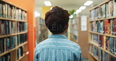 Buy stock photo Education, child and back in library for learning, book search or language development for growth. Boy, student or academic in bookstore for literature, curriculum information or find course textbook