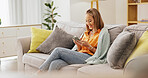 Chat, online and happy woman with smartphone on couch, scroll and communication with contact on web. Texting, home and person with mobile for message, relax and reading post on social media in lounge