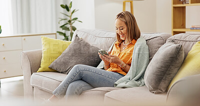 Buy stock photo Chat, online and happy woman with smartphone on couch, scroll and communication with contact on web. Texting, home and person with mobile for message, relax and reading post on social media in lounge